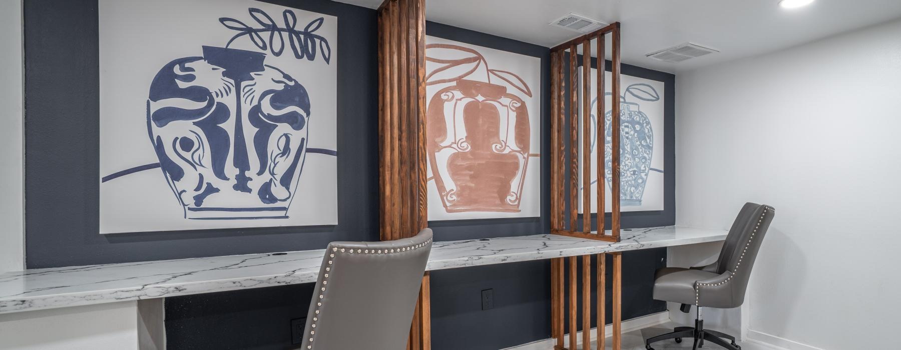 a room with chairs and a desk